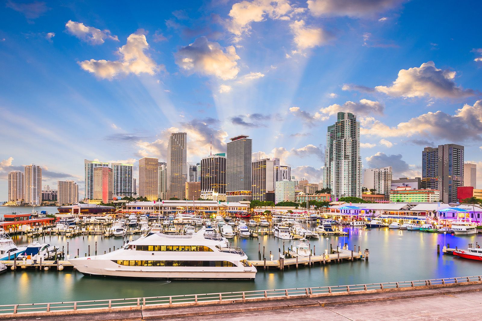 A view of Miami city skyline with beaches and waterfront in the foreground.